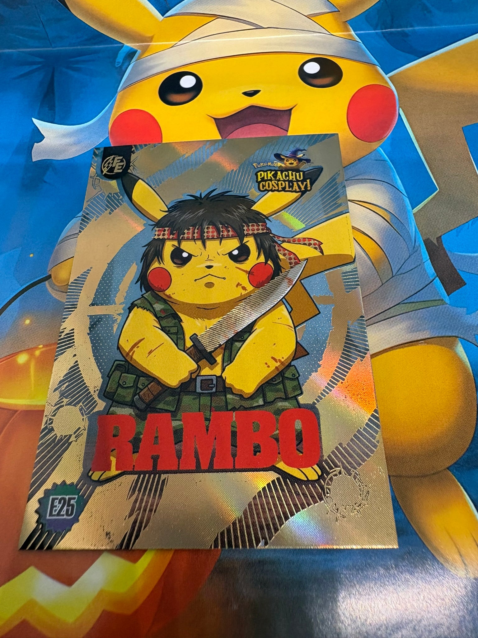 Pikachu Cosplay 1 Horror Hit Card – Rambo Gold E25 Fan Art Collector Card